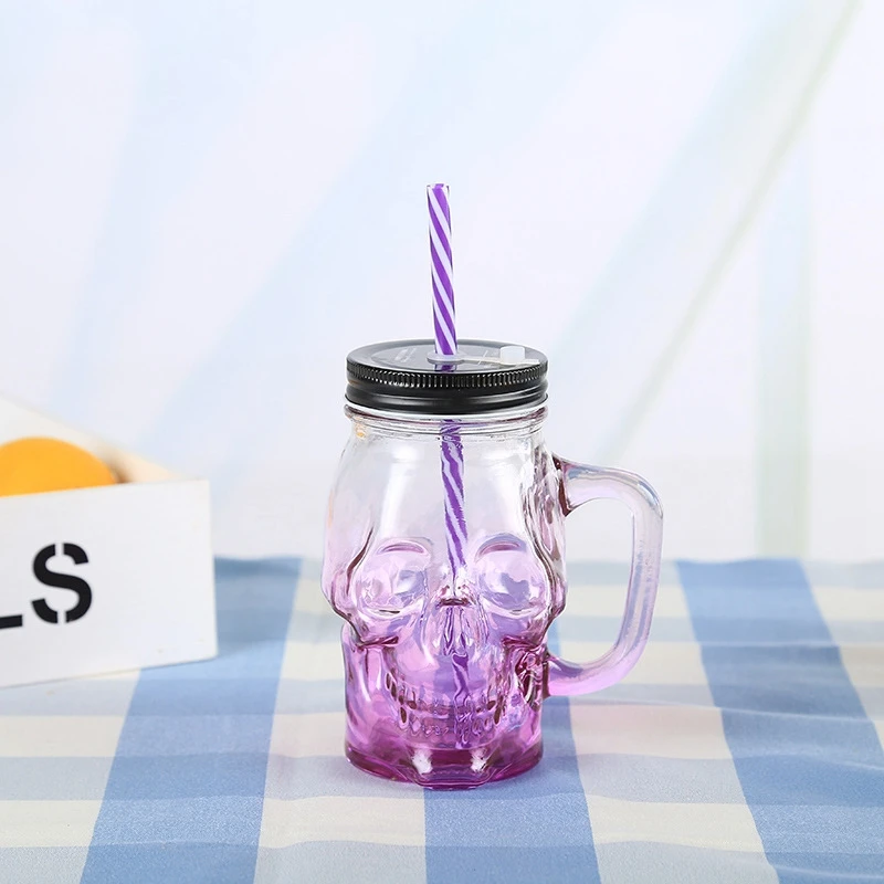 Custom Color Food Grade Skull Shape Wide Mouth Glass Mason Jar with Lids Straw Handle for Beverage Juice Container