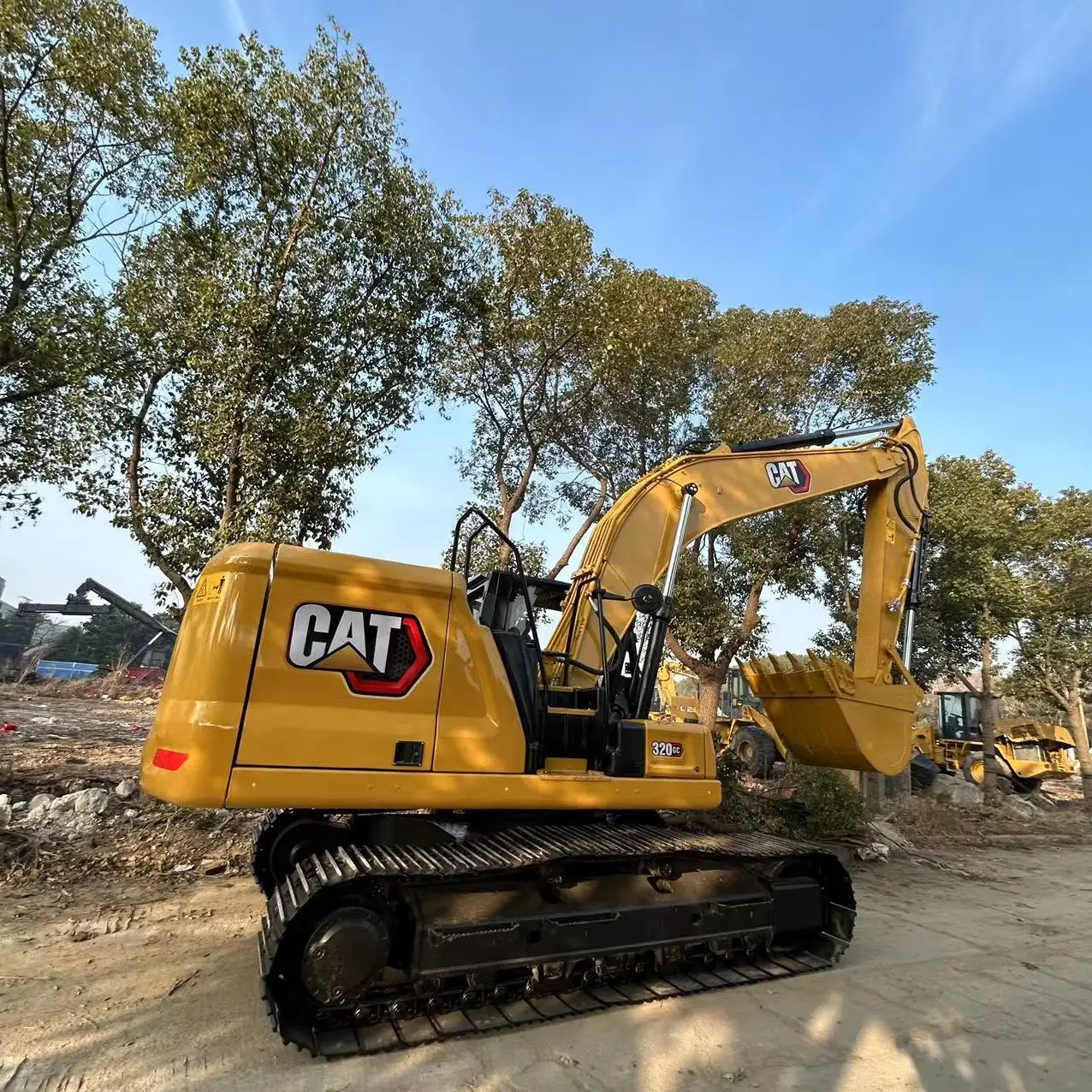2023 б/у экскаватор Caterpillar CAT320GC с хорошим насосом