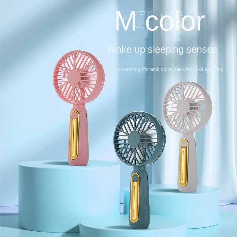 New product mini portable handheld customized color battery fan replaceable battery life handheld electric fan