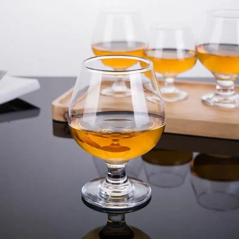 Hot vodka brandy frosted wine glass and brandy whisky glass goblet