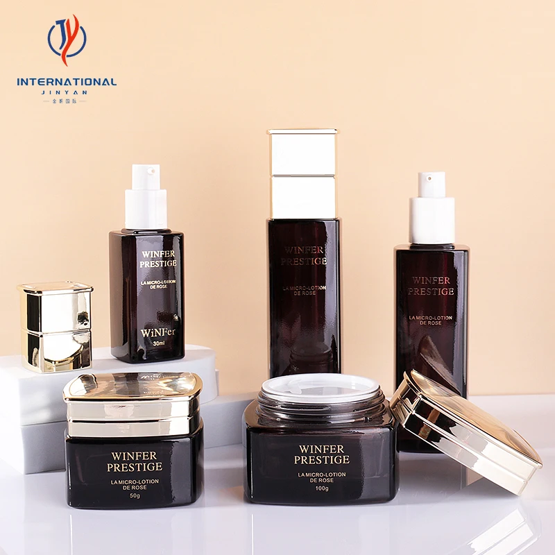 Custom Logo Luxury Glossy Black Gold Glass Bottle lotion Serum Lotion Cream 30ml 90ml 50g 100g Bottle Jar with Golden lid