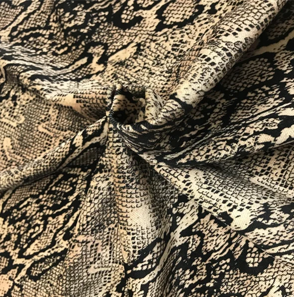 Hot sale interlock Luxury leopard printed knitted velour polyester fabric garment