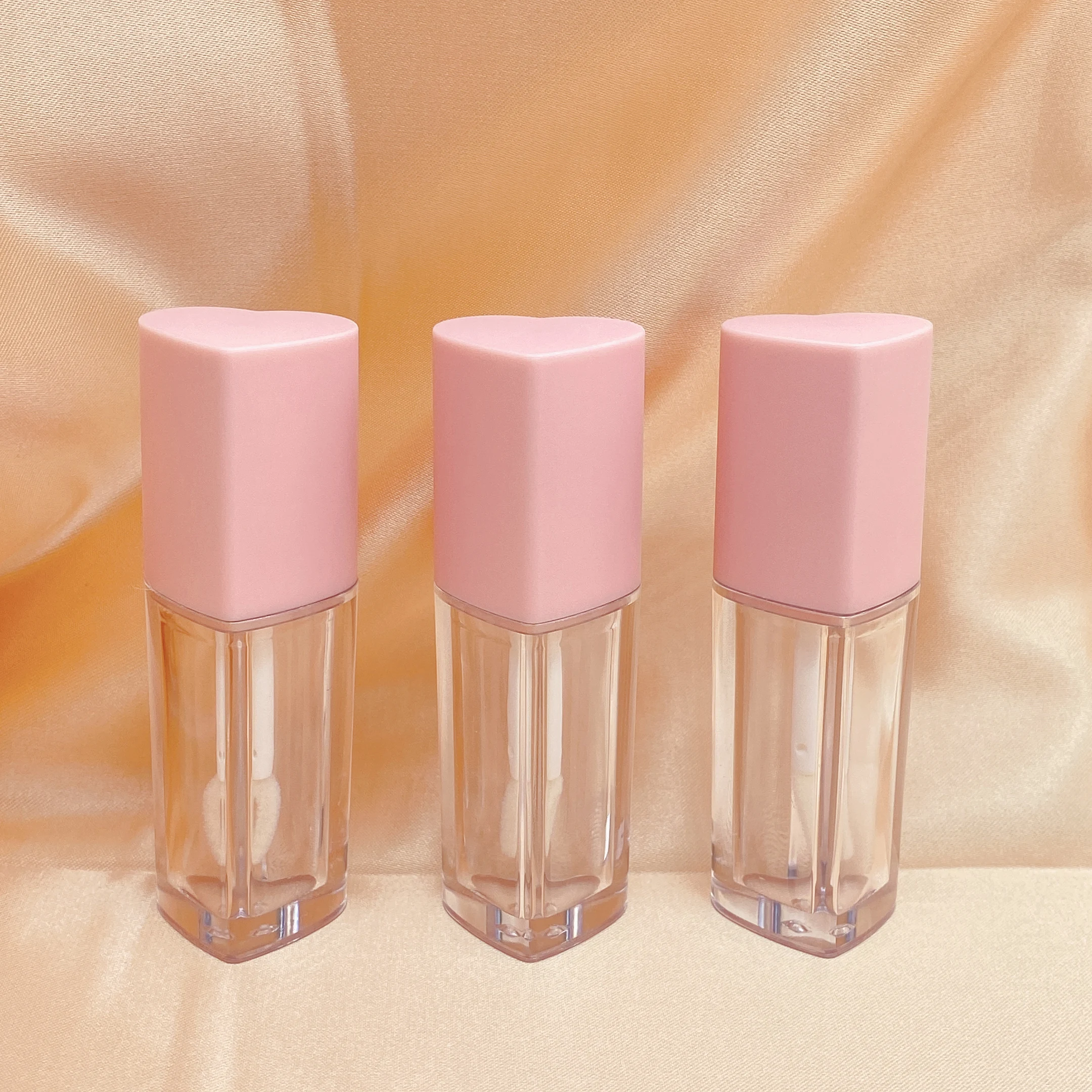 Popular 5ML heart-shaped lip gloss container, large brush head multicolor lip gloss container tube, custom lip gloss tube label