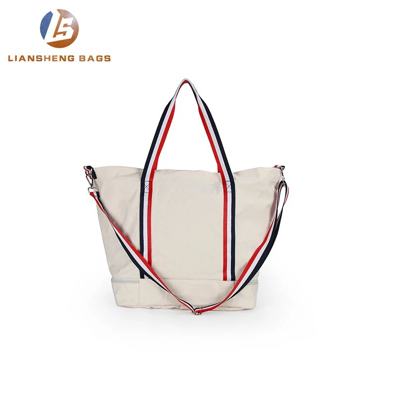 
Large canvas bag with separate layer of shoes and umbrellas underneath 