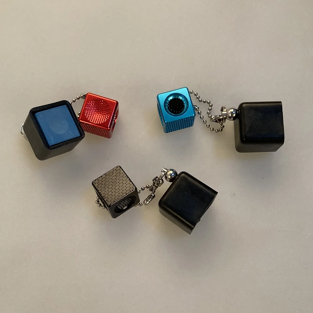 Billiard cue tip cube with billiard chalk holder