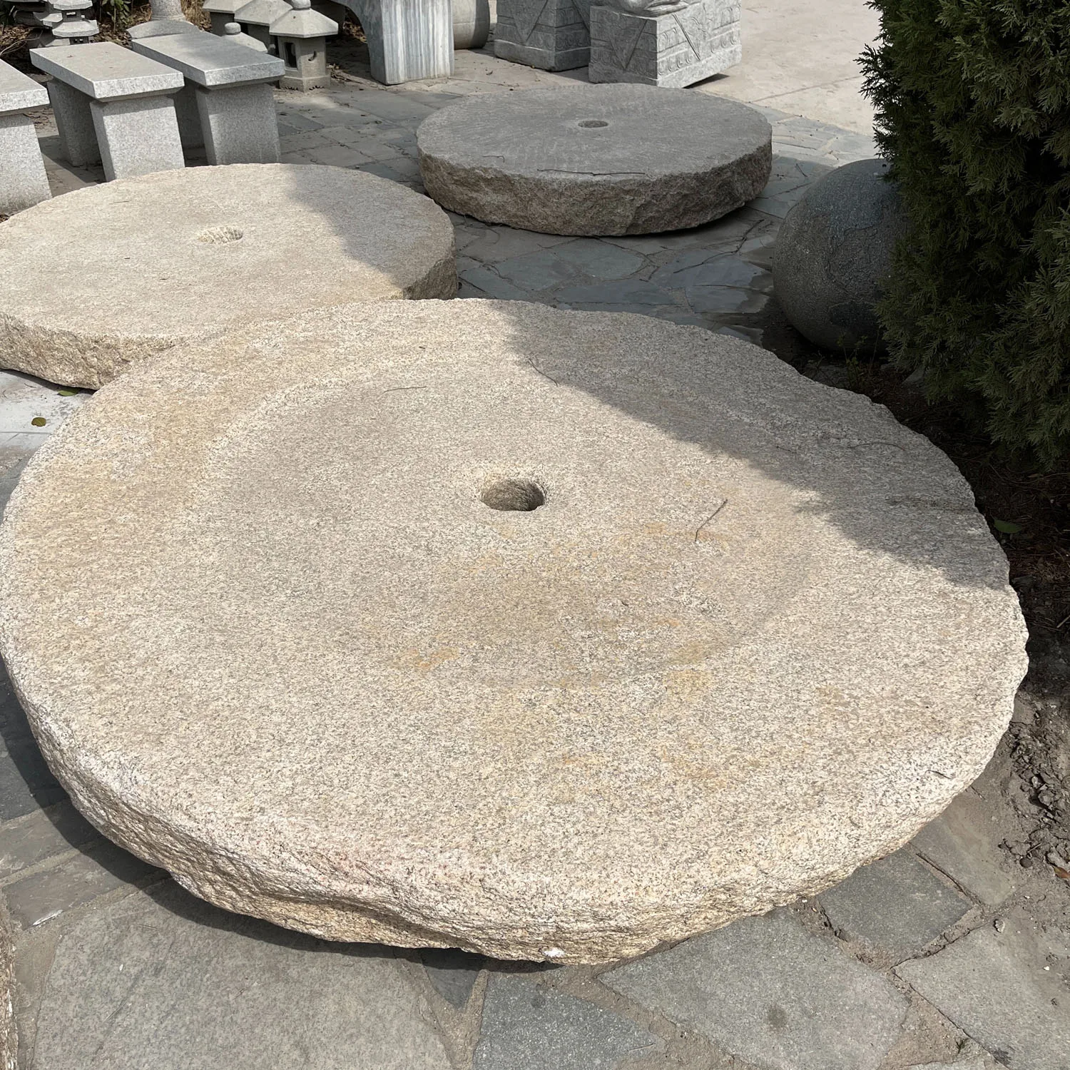 Outdoor stone old millstone antique stone mill buhrimill