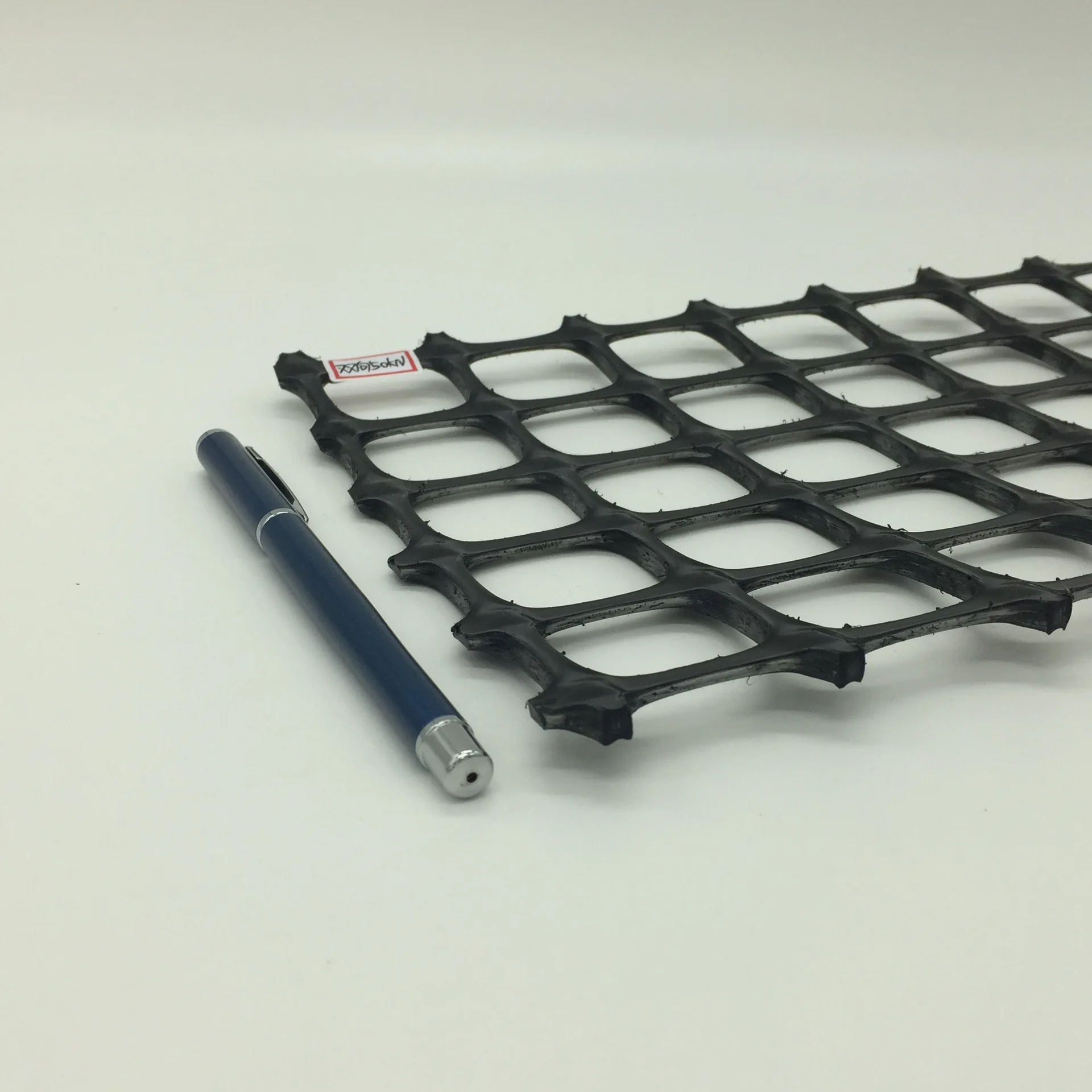 Двухосная георешетка для стабилизации гравийной поверхности, Двухосная георешетка для подкласса для усиления