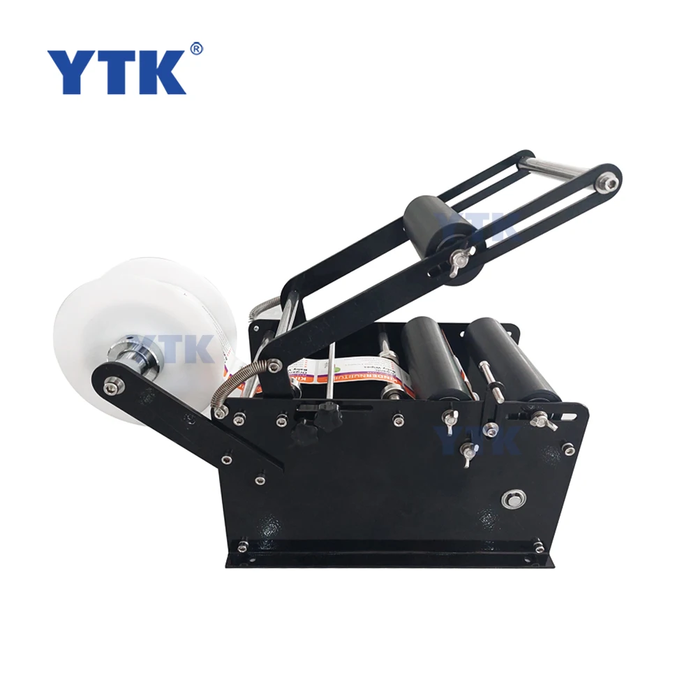 YASON YTK-L100N Manual Mineral Water Plastic Round Bottle Labeling Machine For Round Bottles Sticker Label Packing Machine