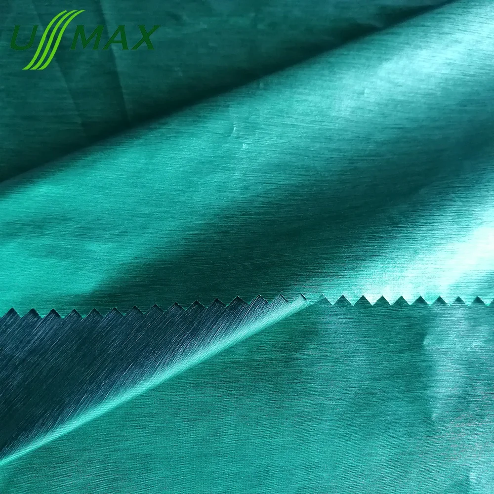 
20d Nylon polyester two color tones shiny taffeta calendering fabric for down proof jackets wears 