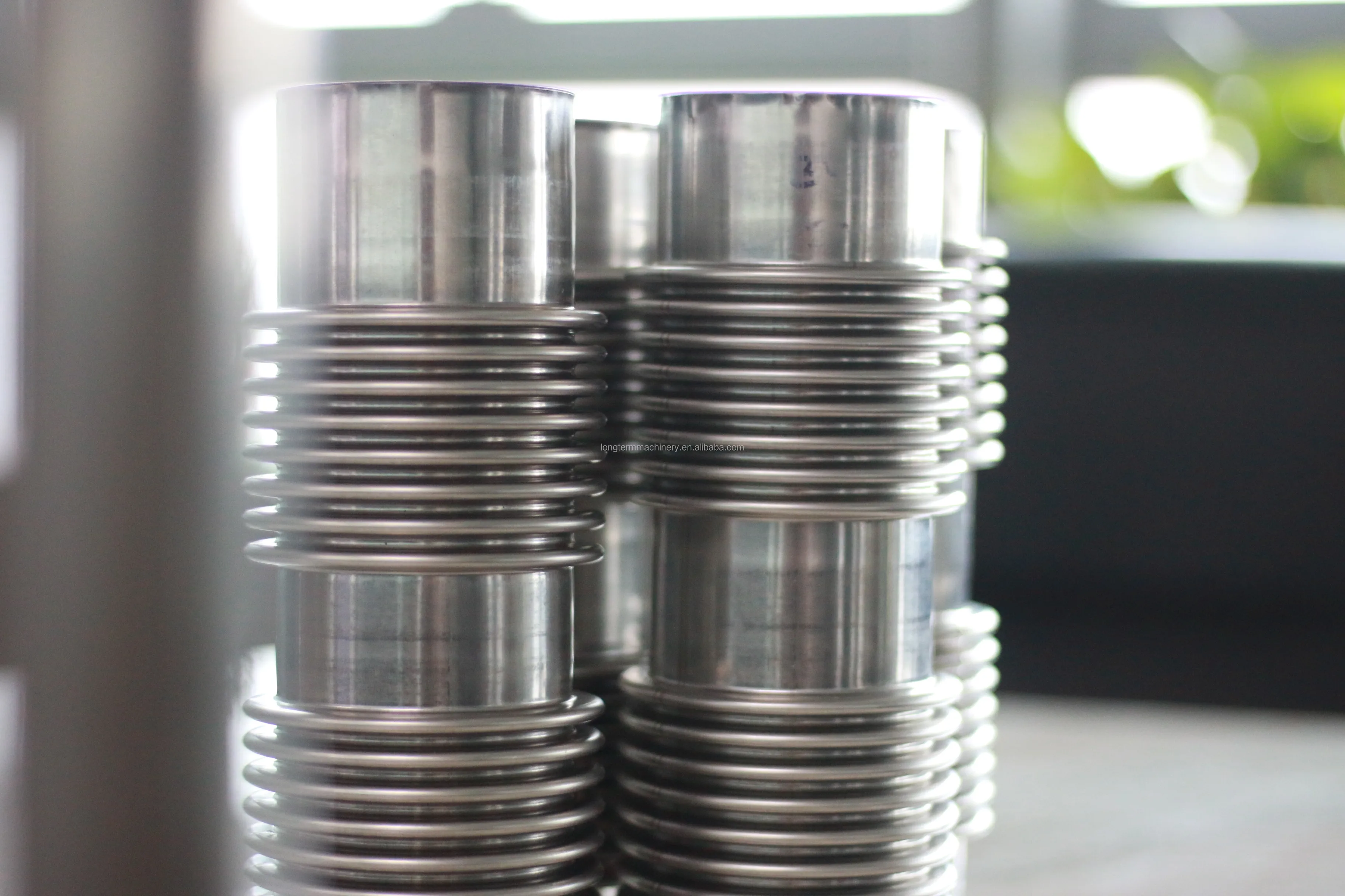 Expansion joint bellow forming machine for air conditioning systems