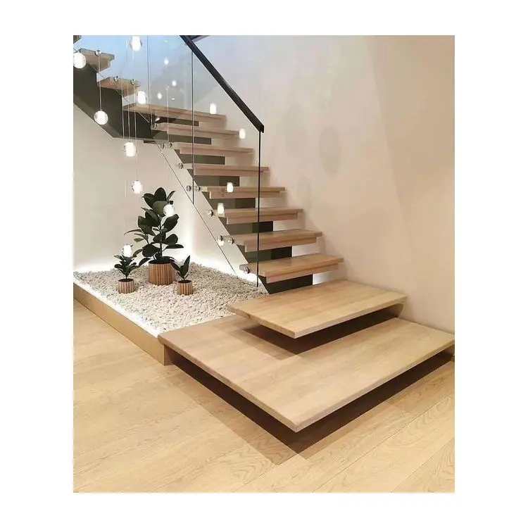 indoor light home stairs with floating design and glass railing