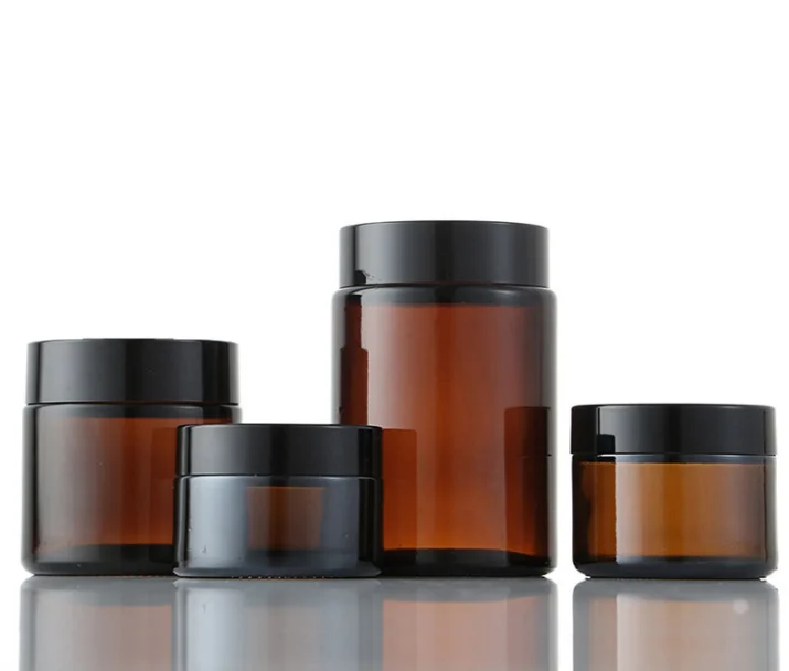 
20Ml 30Ml 50Ml 60Ml 100Ml Cosmetic Container Facial Cream Amber Glass Jar With Gold Metal Aluminum Lids Black Caps In Stock 