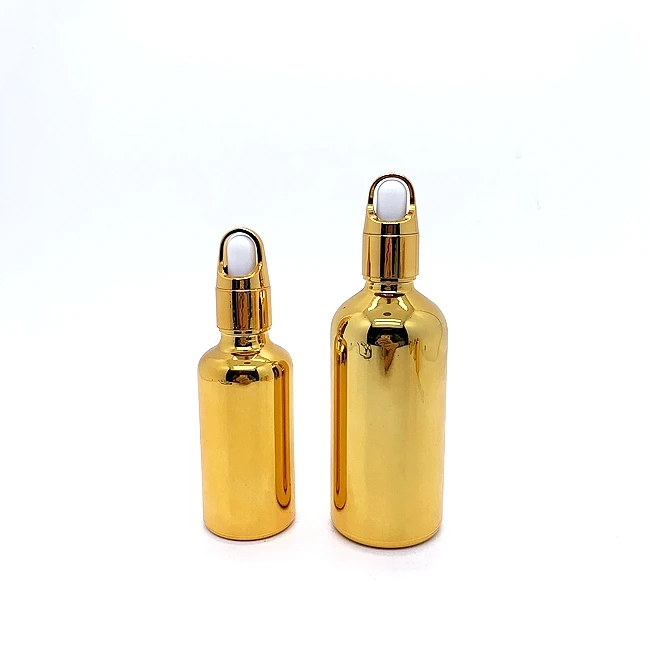 China Factory Hot Sale Luxury Gold Glass Bottle with Dropper Essential Oil Packaging for Cosmetic Serum and Hair Mascara