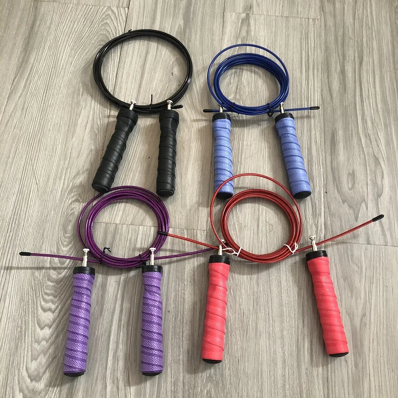 Low price sweat absorbing racing bearing wire gym skipping rope weighted jump rope pvc fitness equipment
