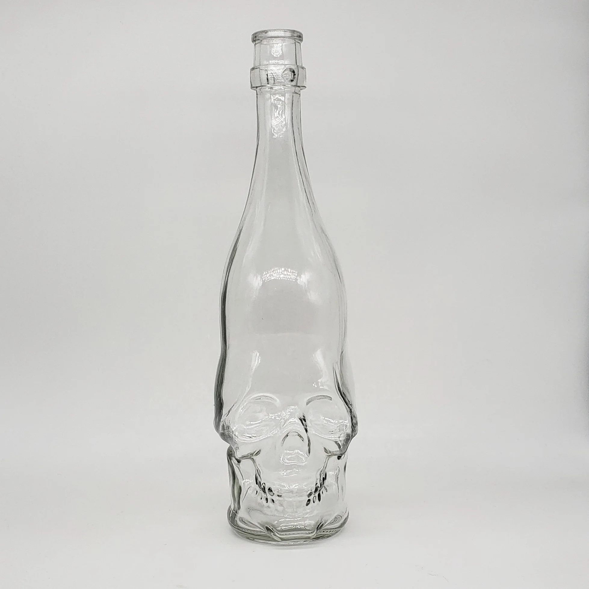 Wholesale skull bottle glass whisky vodka brandy spirit cork bottle