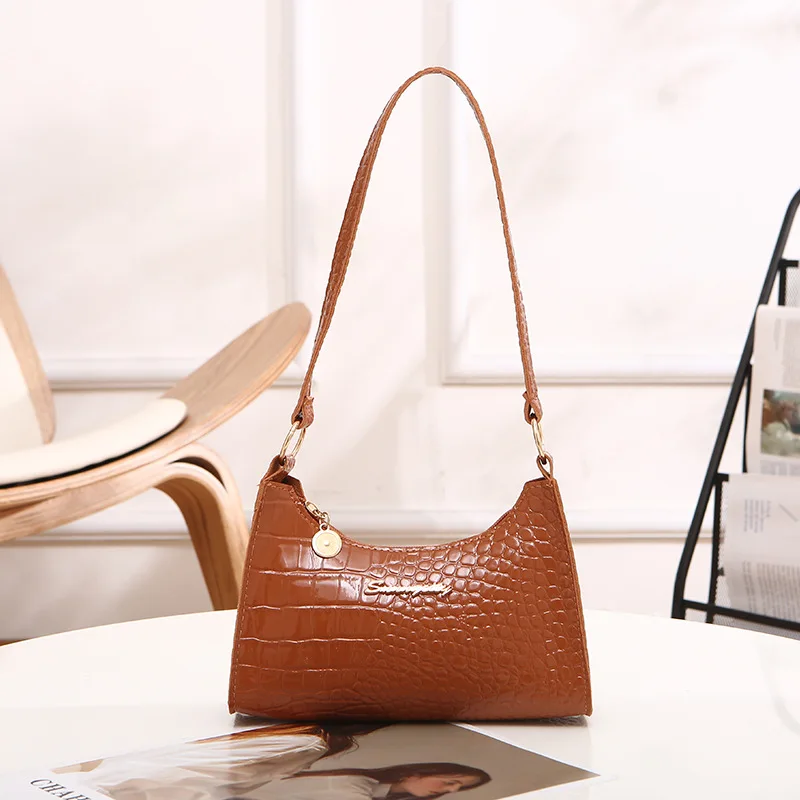 The 2022 new bag is a horizontal-style handbag, a new womens bag, which is a womens handbag that can be hung under the armpit