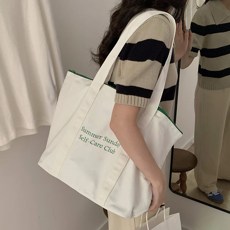 2024 New minimalist commuting custom logo women large capacity zippered shoulder bag canvas tote bag for college students
