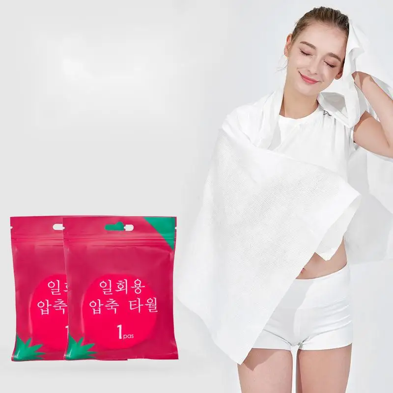 Customized 135 * 60 cm independent packaging biodegradable non-woven fabric travel hotel disposable white bath towel