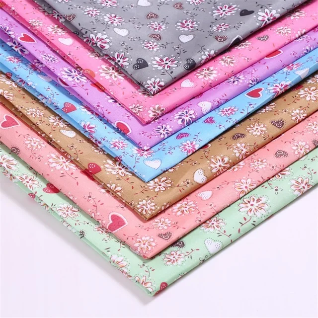 Stock alot love flower polyester fabric garment fabric foreign trade original single manufacturer wholesale for Africa Dubai