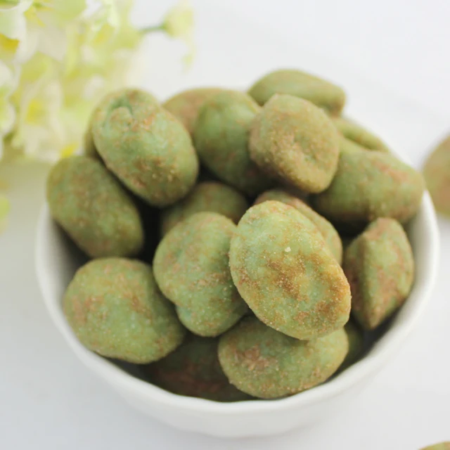 Wasabi coated ravioli shape peanut cracker snack