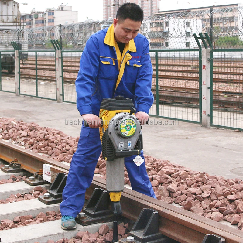 Portable and efficient railway equipment ballast tamping tool with gasoline engine