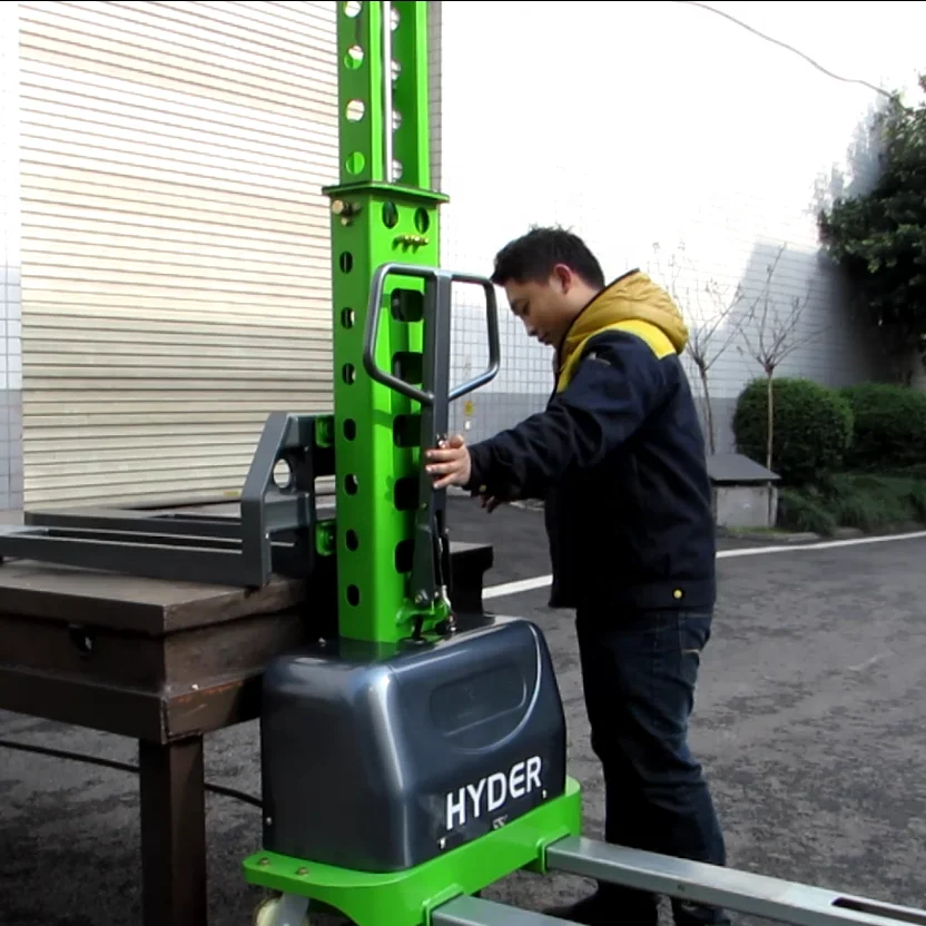 Electric powered self loading stacker for alternative solution to truck ramp and hydraulic pallet truck