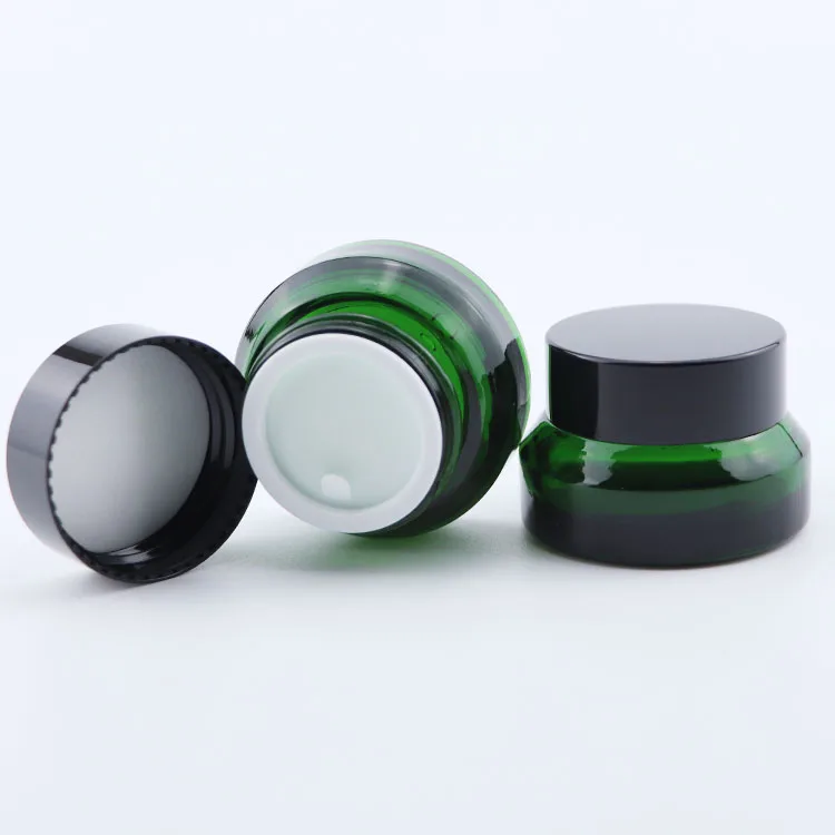 
sloping shoulder jar frosted olive green glass jar cosmetics cream skincare packaging 