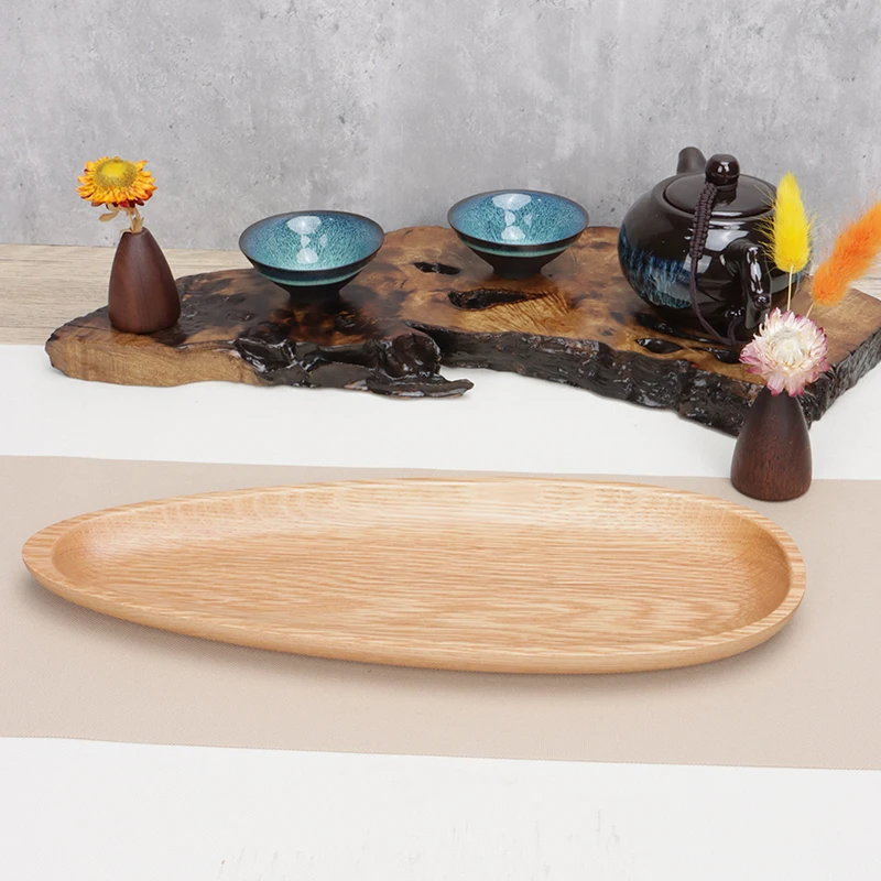 The snack tray of melon seed shaped white oak fruit plate is coated with food grade environment-friendly silicone coating