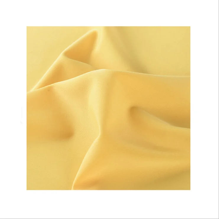 
Semi-dull warp knitted 4 way stretch 85 polyester 15 spandex stretch swimwear fabric with good color fastness 