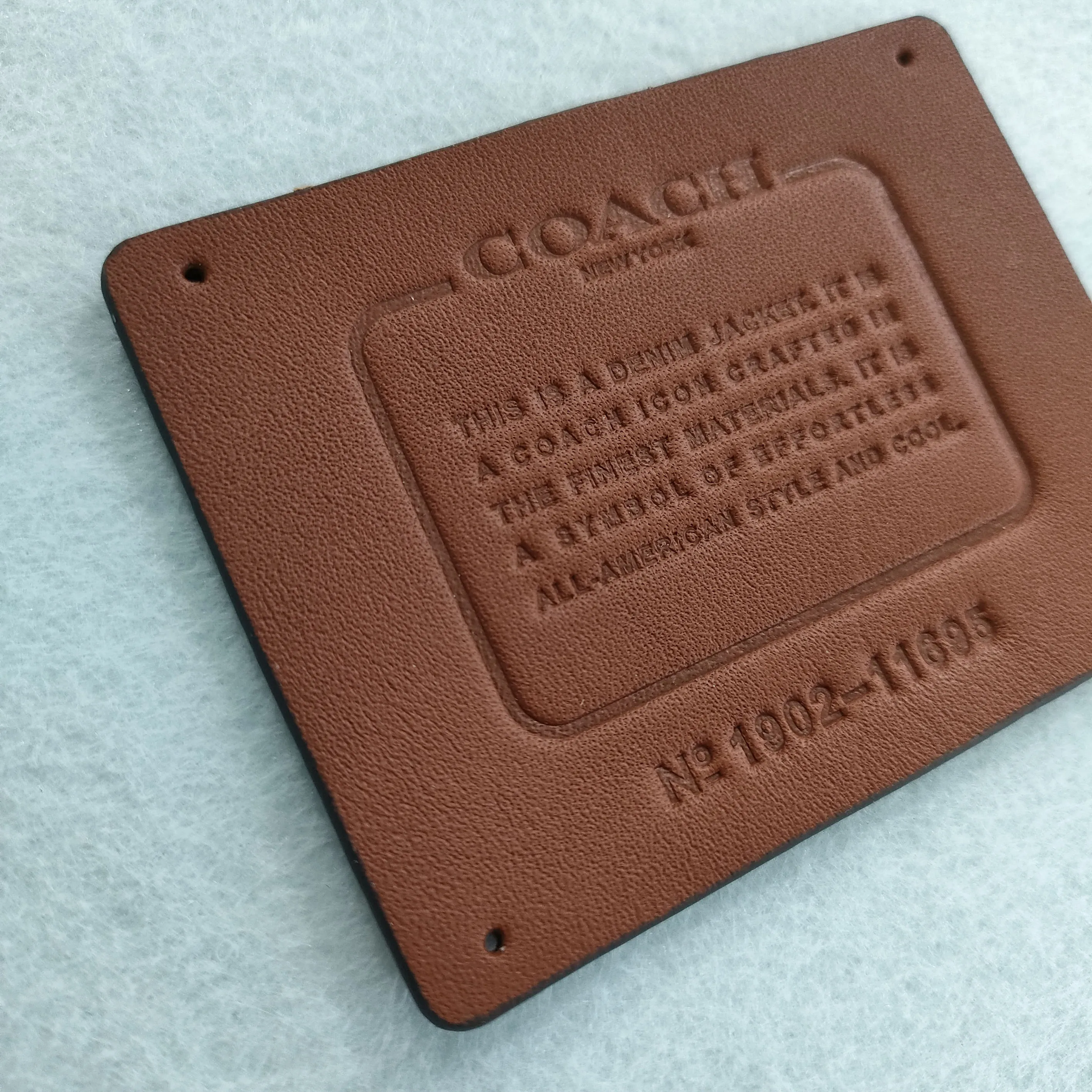 Wholesale real manufacturer free sample leather embossed LOGO denim leather label patch