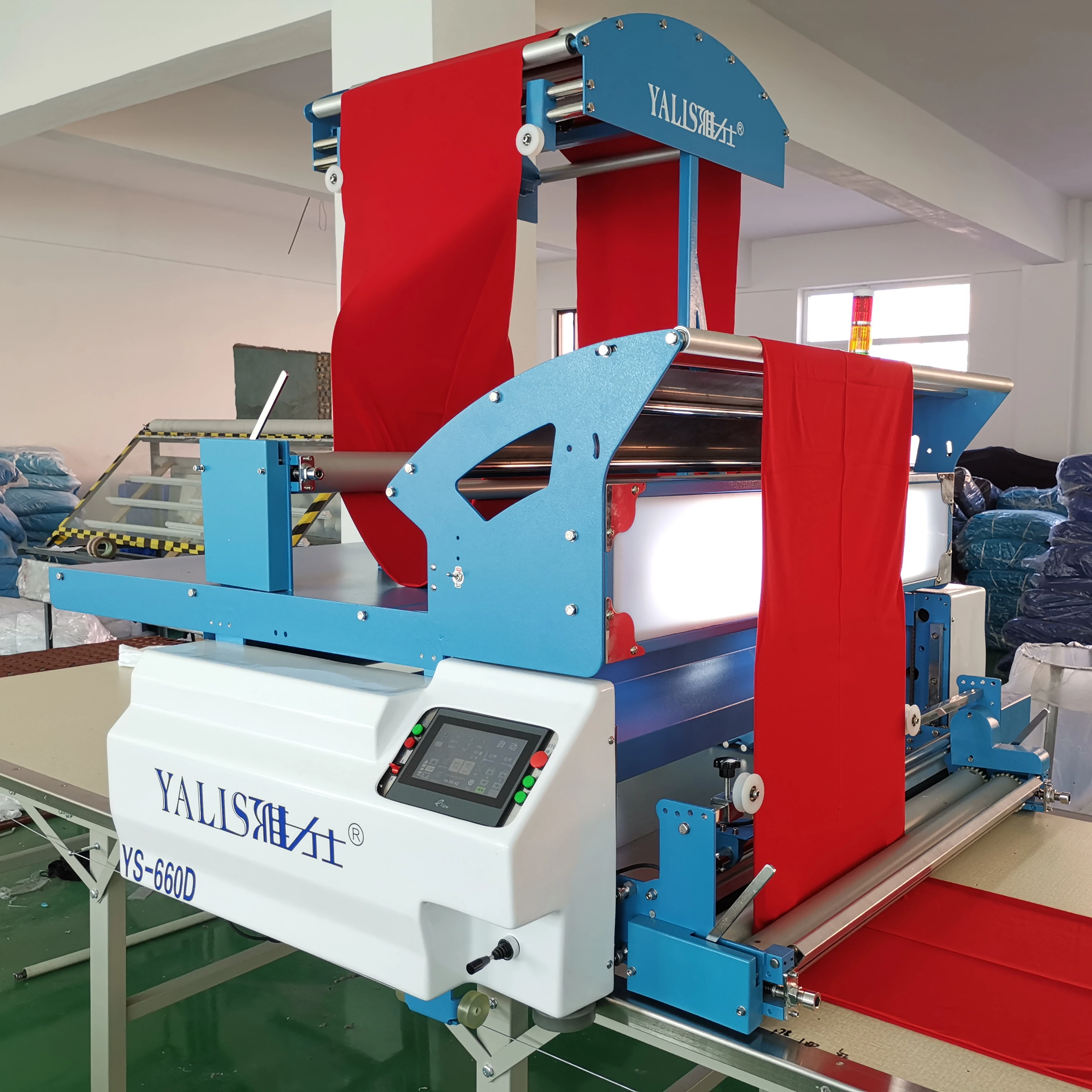Automatic tubular fabric spreading machine for textile plant and garment factory