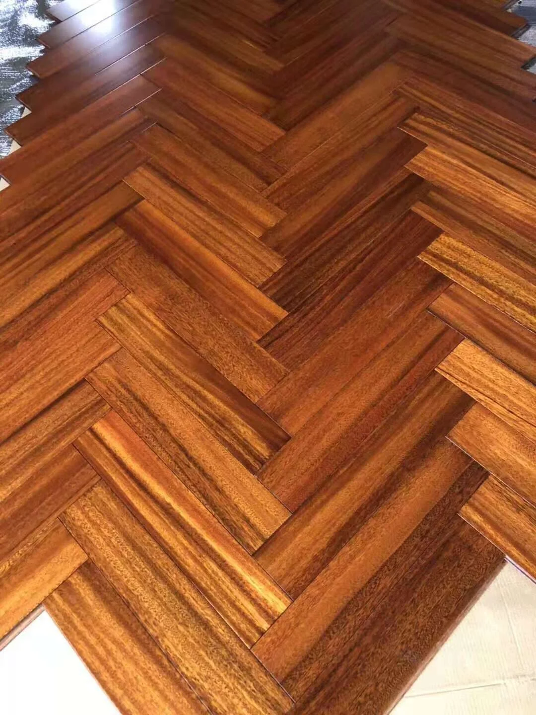 natural UV iroko herringbone parquet wood floor