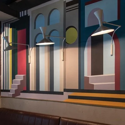 Italy NEMO Nordic designer living room bedroom bedside model room decoration adjustable rotating warm wall lamp