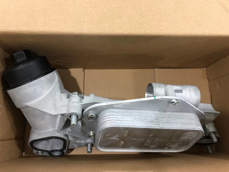 Масляный радиатор двигателя с масляным фильтром в сборе из алюминия 93186324 12992593 25199751/ 931 863 24 /129 925 93/ A0014A0054