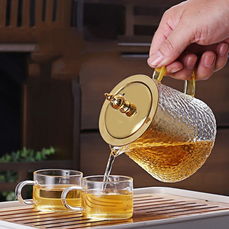 New Design Stove Top Safe 450ml 650ml 900ml Hammer Glass Teapot With Golden Color Stainless Steel Lid And Strainer