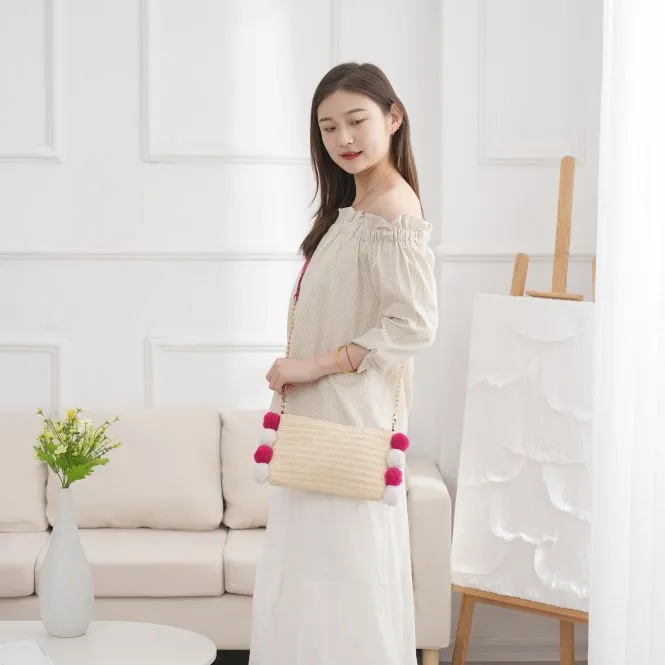 Pompom straw beach bag  straw clutch handmade straw shoulder bag designer handbags famous brands