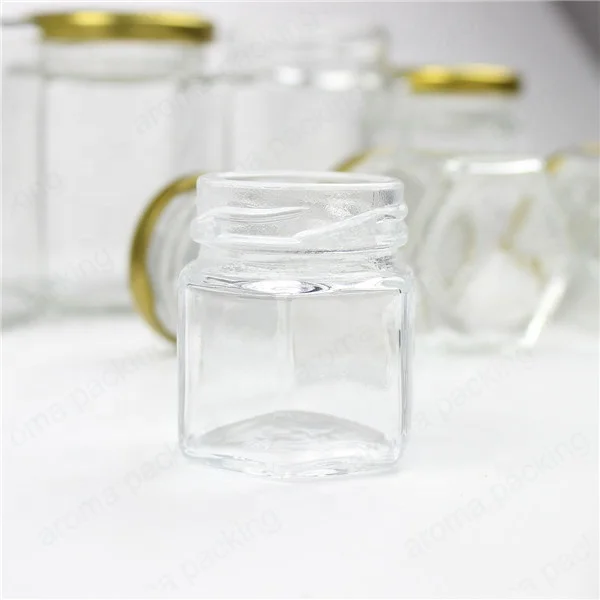 Wholesale 30ml 50ml 60ml Clear Glass Storage Jar Hexagon Kitchen Glass Bottle Round Glass Honey Jar  With Gold Lids