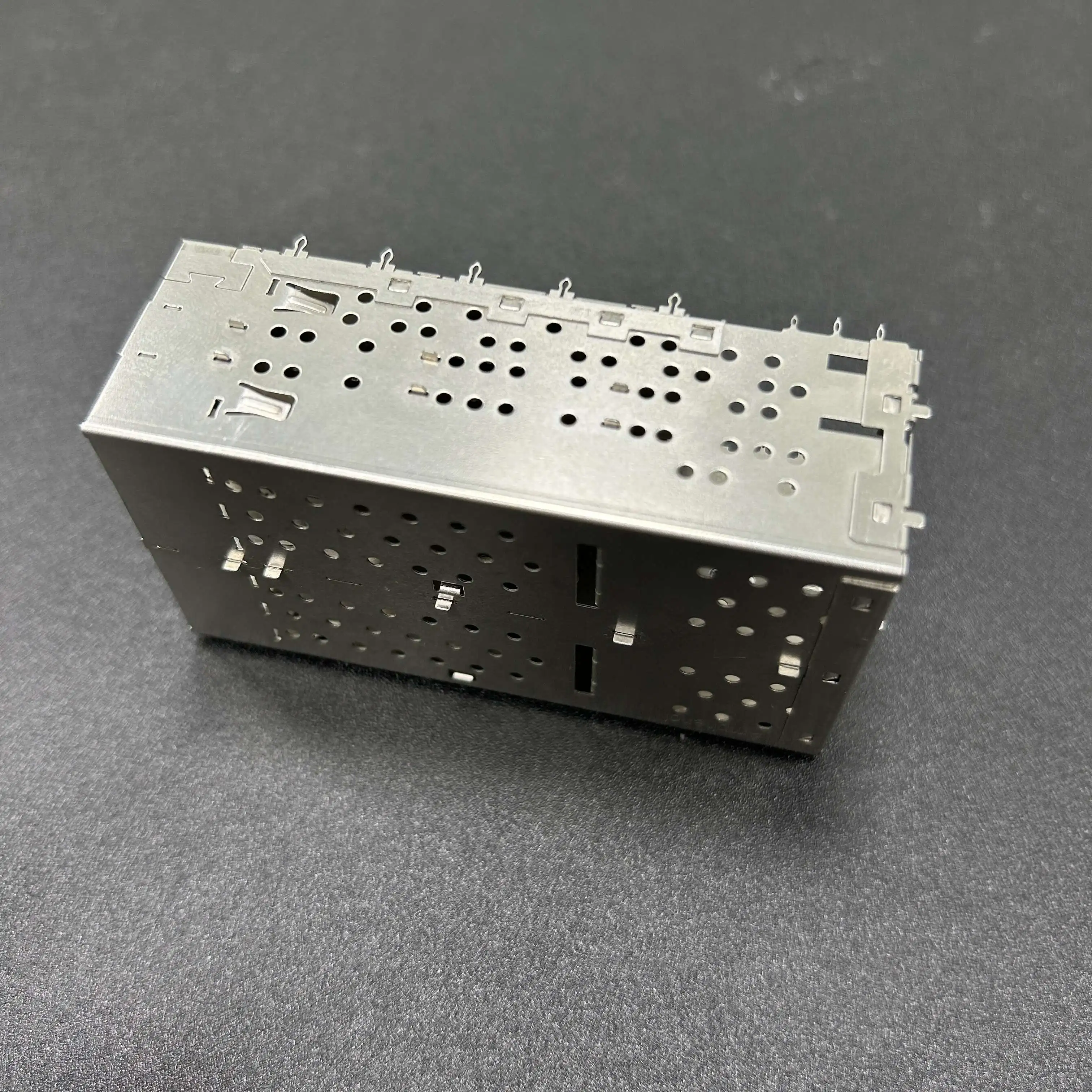 Optical fiber connector module shield cover The optical fiber module has a seat son shield Metal shield crimp pin connector