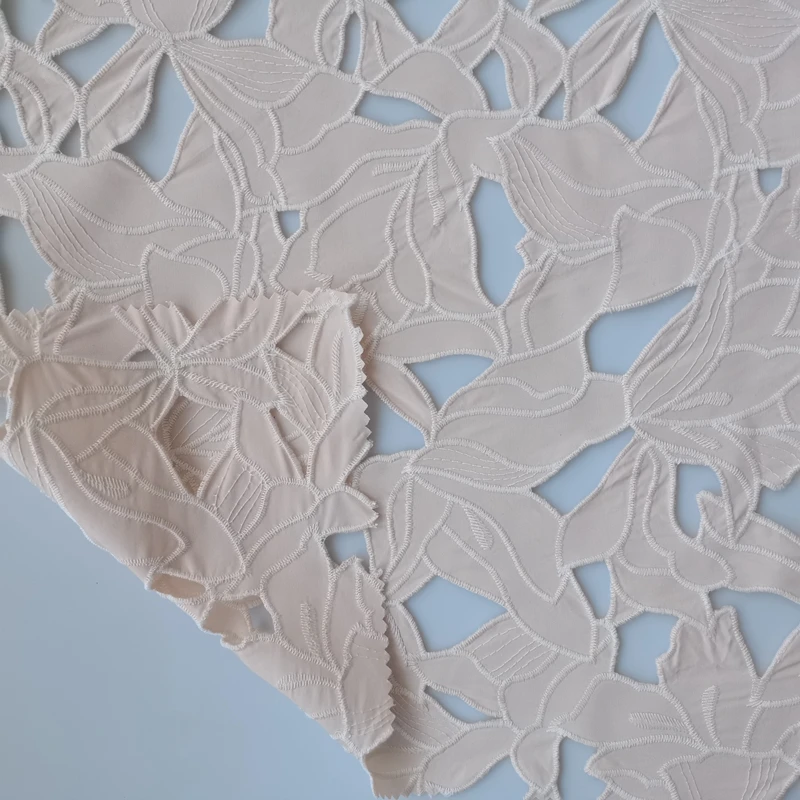 Best Quality 100% Polyester 190gsm Very Exquisite Hollow-Out Daffodil Pattern Embroidery Fabric For Women Garment And Textile