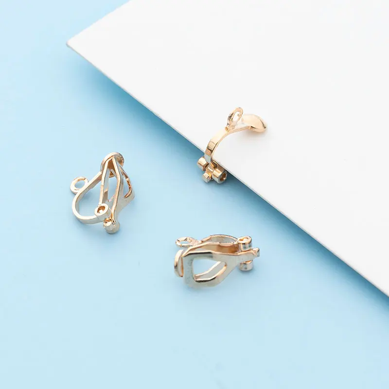 Wholesale delicate fashion open and close gold plated perforated copper earrings, white K, KC gold hollow triangle earrings