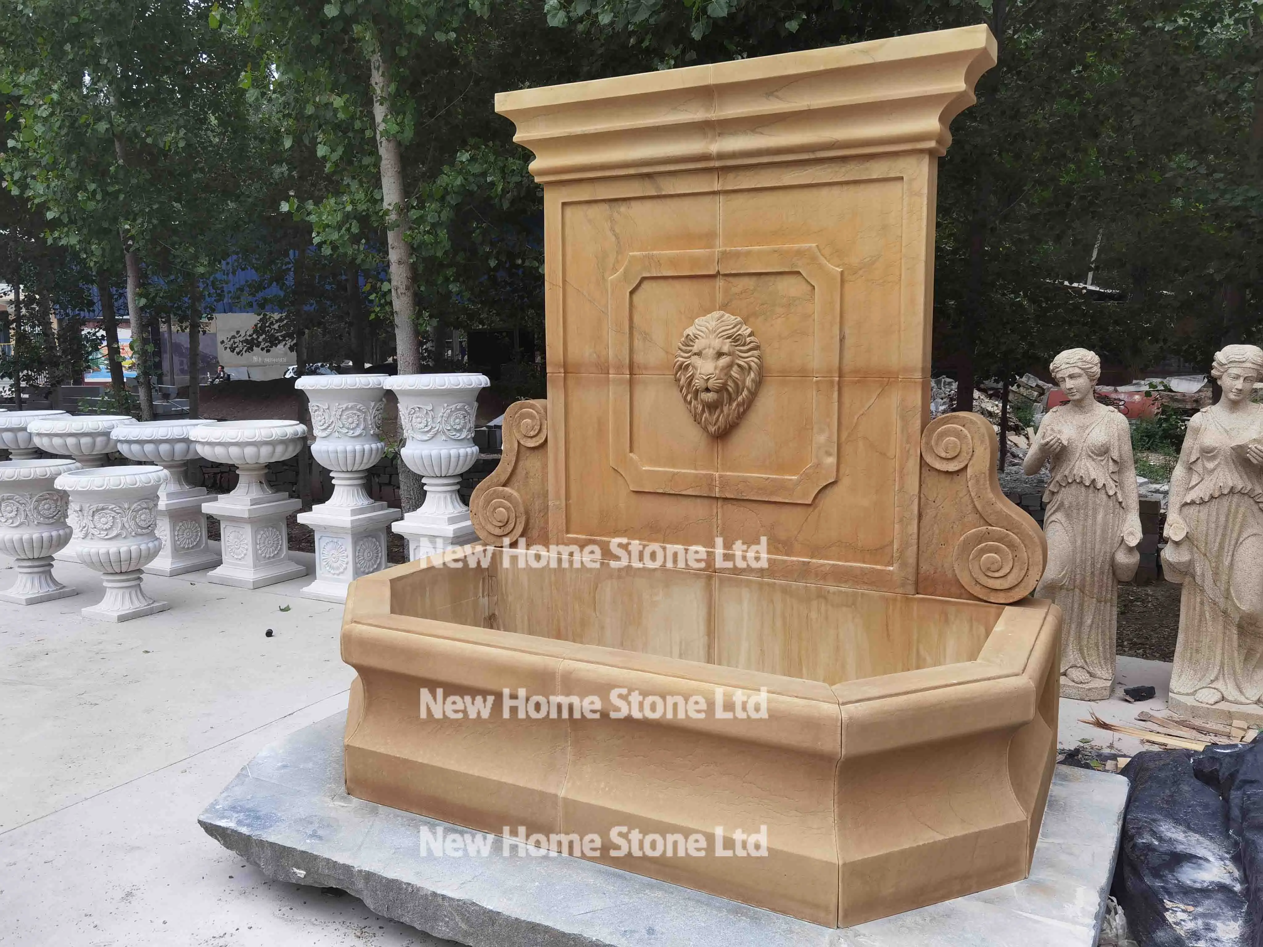 Antique beige stone wall fountain with lion head waterfall marble water limestone fountain for garden decor