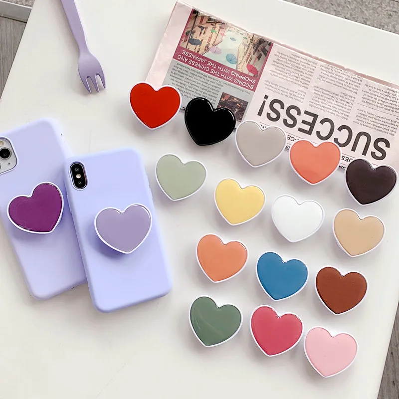 New solid color heart-shaped epoxy resin mobile holder phone grip promotional gifts custom phone sockets with logo