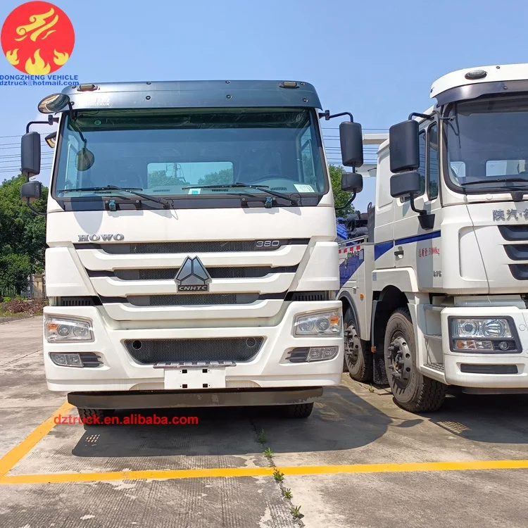 Sinotruck howo 8X4 30tons 50tons LHD heavy duty Dragging and lifting multifunction road wrecker rescue truck fow sale