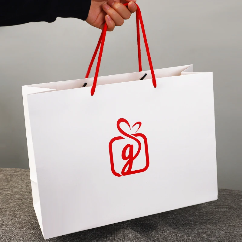 Wholesale White Black Luxury Gift Garment Shopping Clothes Packaging Twisted Handles Cardboard Paper Bags With Your Own Logo