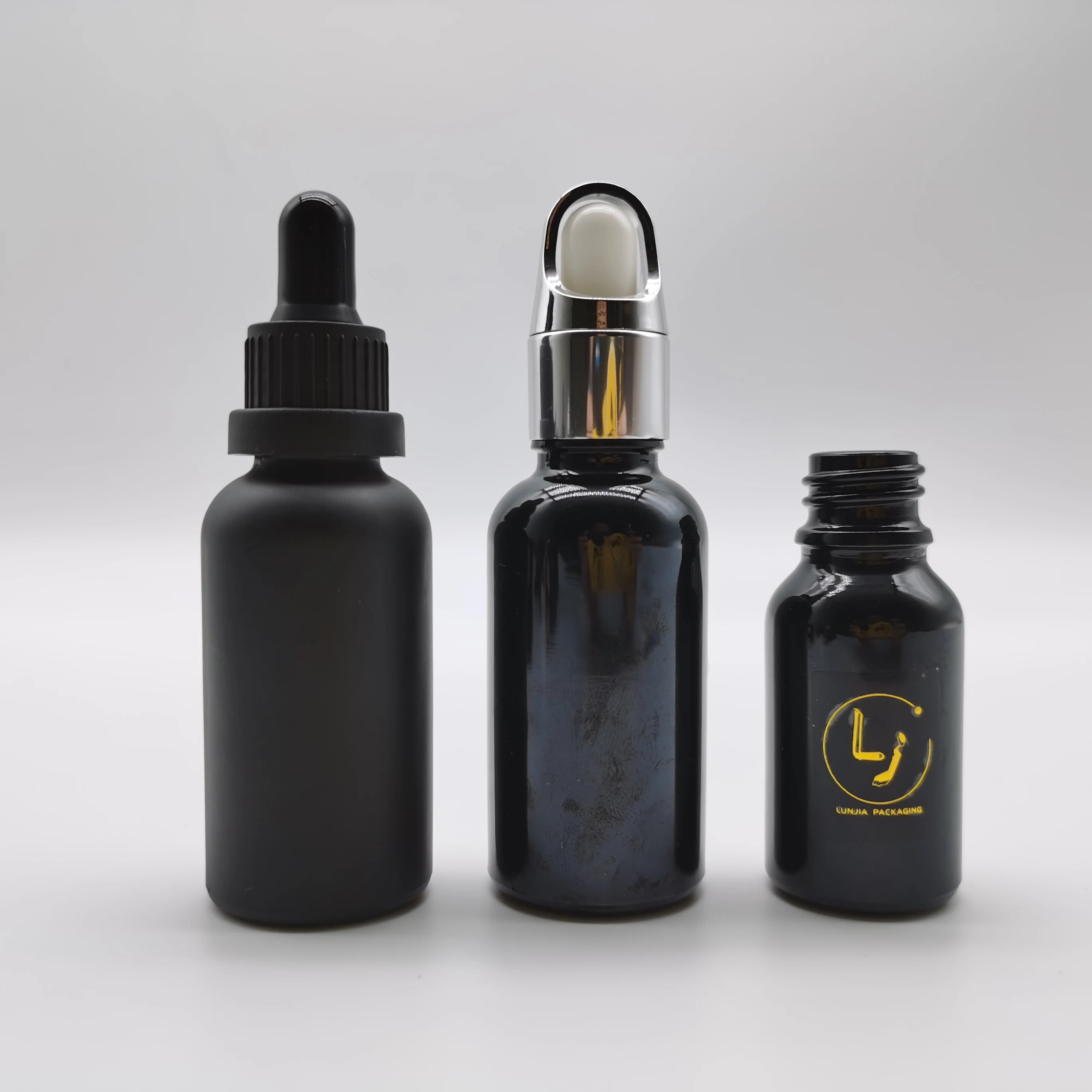 Best selling 30 ml 50ml original shiny black glass dropper bottle 15ml 100ml hair oil essential oil repair serum glass bottle
