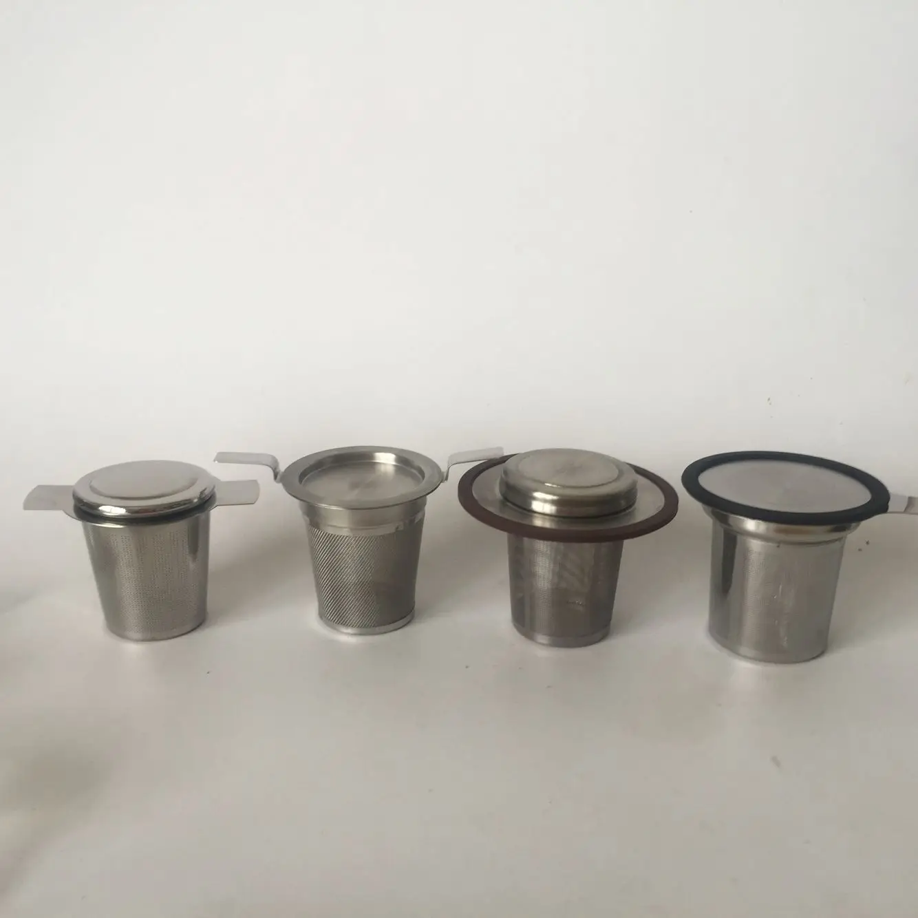 Custom Simple Rust-Resistant Stainless Steel 304 Tea Infuser Handle Food Safe Metal Mesh Filter Ceramic Silver Tea Filter
