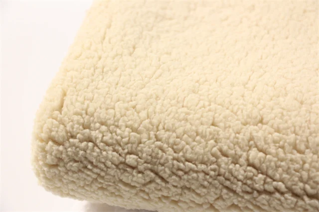 Hot sale solid color lamb wool fabric high quality polyester coral velvet fabric for clothing