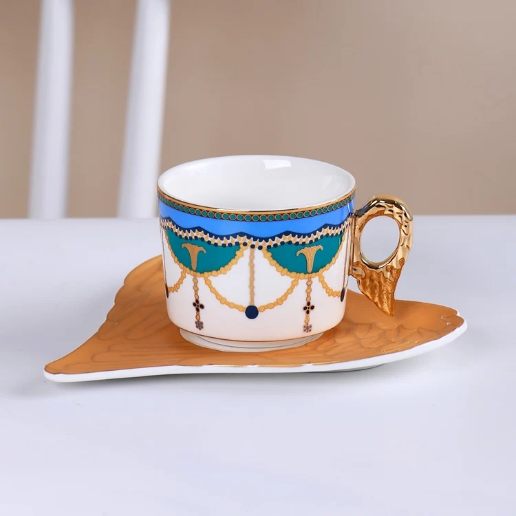 Luxury Gold Classic Tea Cup Coffee Cup with Heart-shaped Saucer Porcelain Cups Angel Wing Handle