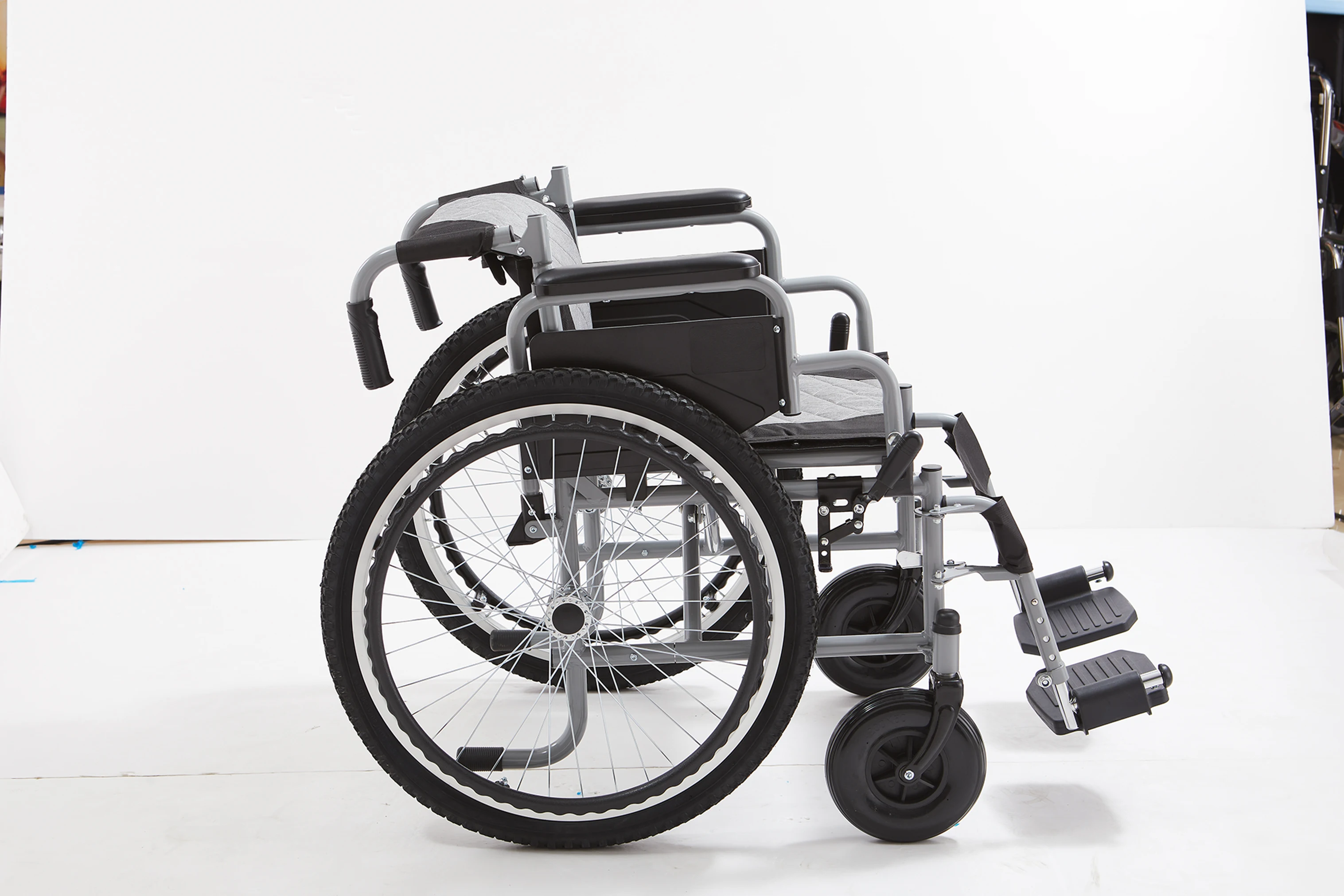 Functional Steel Manual Wheelchair for Elderly with Orthotics Flip Armrests and Detachable Footrest manual wheelchair