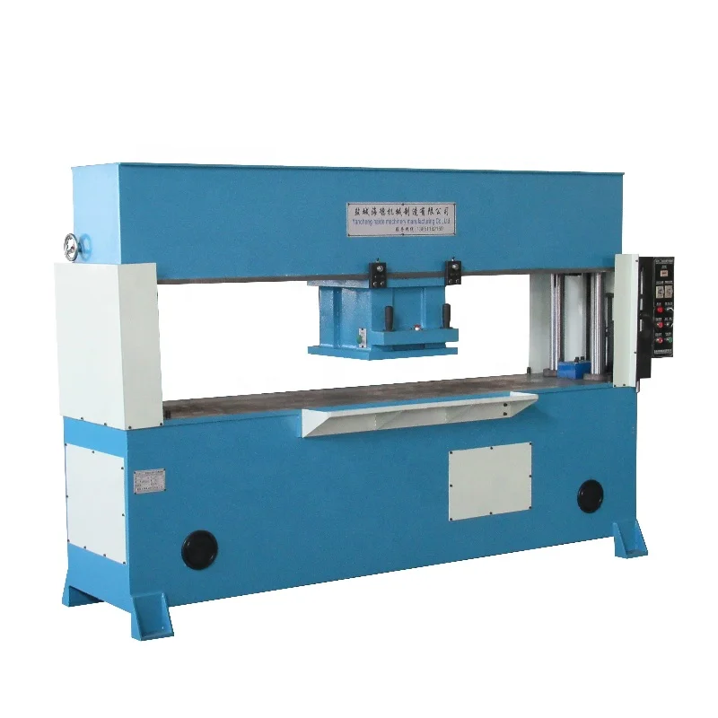 Hydraulic travelling head lampshade cutting machine